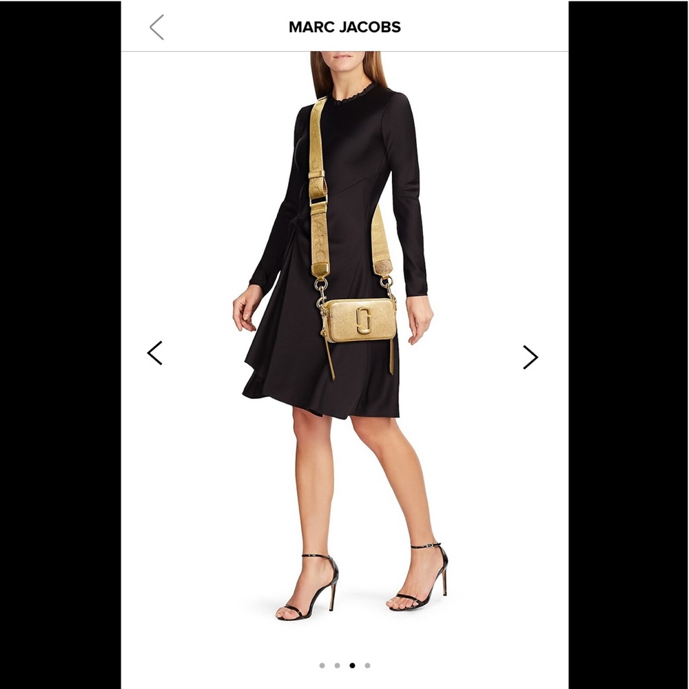 NWT Marc Jacobs camera bag in gold with long strap.Never worn,unwanted gift